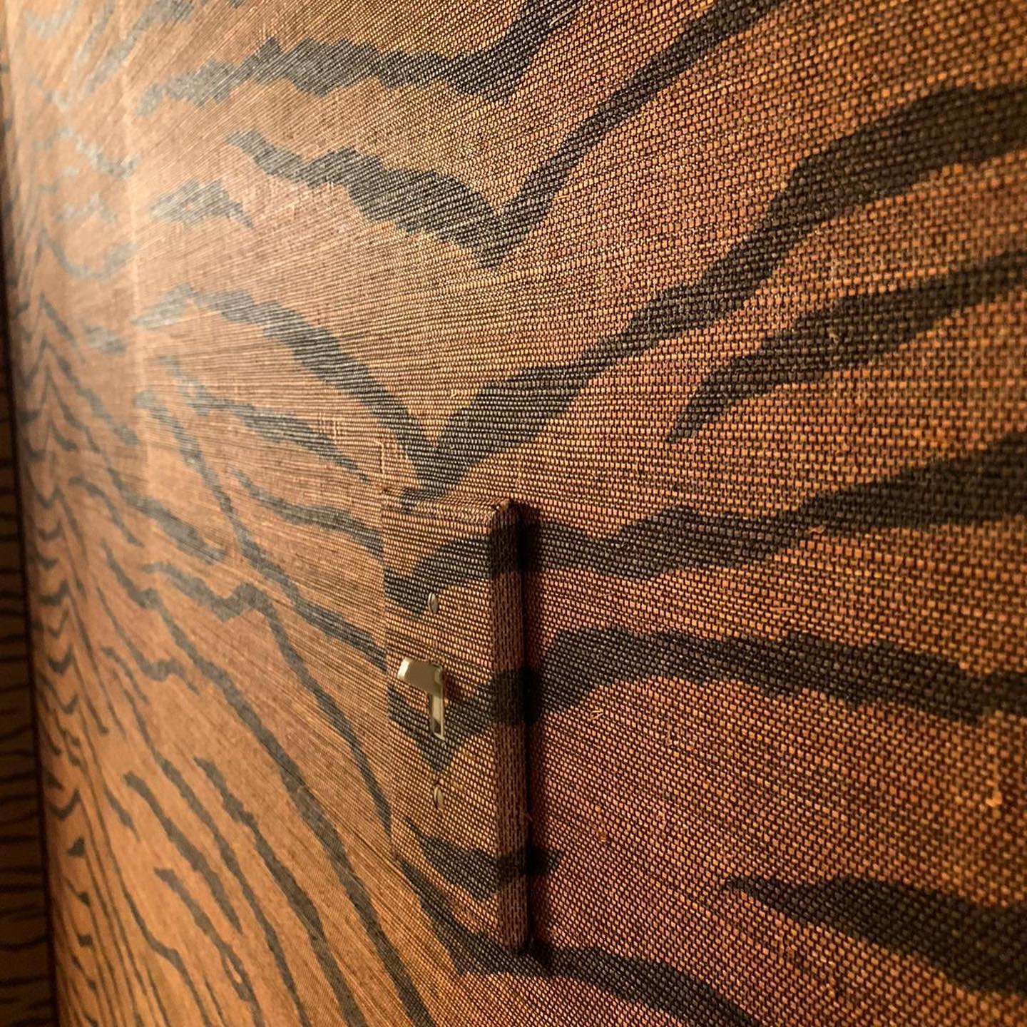 Close view of a richly textured wallcovering surface